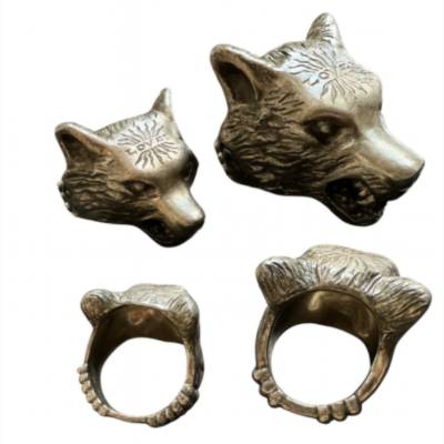 Before restoration: Gucci wolf head rings